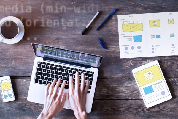Webdesigner,Sketching,Responsive,Website,Wireframe,Mockup,With,Laptop,,Smartphone,And Webdesigner,Sketching,Responsive,Website,Wireframe,Mockup,With,Laptop,,Smartphone,And